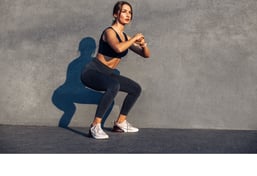 woman.doing.squats